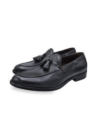 Black leather loafers with a sleek design, featuring a rounded toe and decorative tassels. Sturdy sole with visible stitching accents.