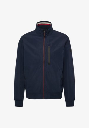 Marineblauw jack met ritssluiting, geribbelde manchetten, twee voorzakken met knopen, een verticale borstzak met rits en een kraag met gestreepte voering.