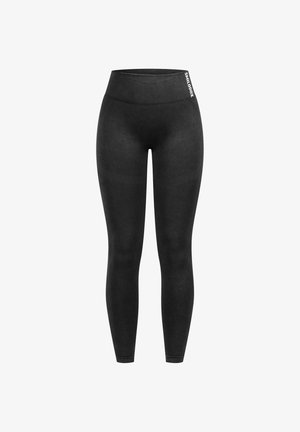 Leggings noirs en tissu lisse et extensible. Design taille haute avec une ceinture côtelée et un petit logo sur le côté.