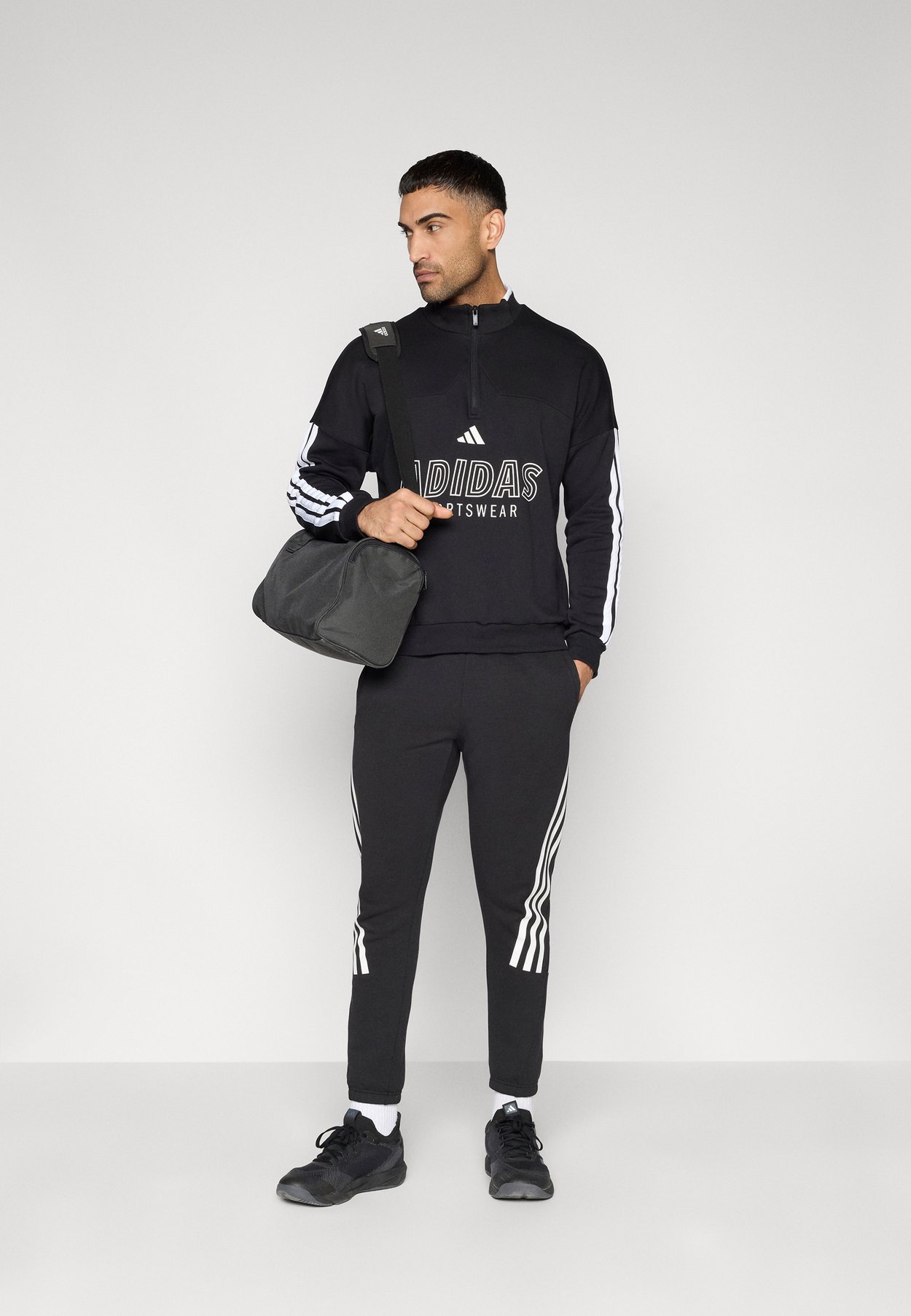 HOUSE OF TIRO HALF ZIP