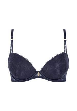 Soutien-gorge en dentelle marine avec armatures, motif floral, bretelles ajustables et un accent doré au centre. Texture lisse et bonnets moulés.