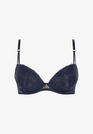 Soutien-gorge en dentelle marine avec armatures, motif floral, bretelles ajustables et un accent doré au centre. Texture lisse et bonnets moulés.
