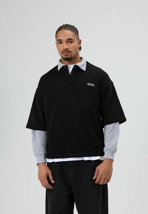 LAYERED SLEEVE DETAIL - Polo - black