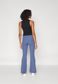 Sweaty Betty FLARE TROUSERS - Punčochy - endless blue