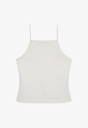 Crop top blanc sans manches avec fines bretelles et logo "cK" subtil brodé sur la poitrine, fond uni.