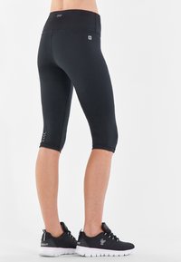 Freddy SUPERFIT CORSARO IN TESSUTO TRASPIRANTE SOSTEN - Pantaloncini 3/4 - nero