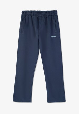 Navy blue sweatpants with an elastic waistband, two side pockets, and a reflective "PEGADOR" logo on the left leg. Smooth fabric texture.