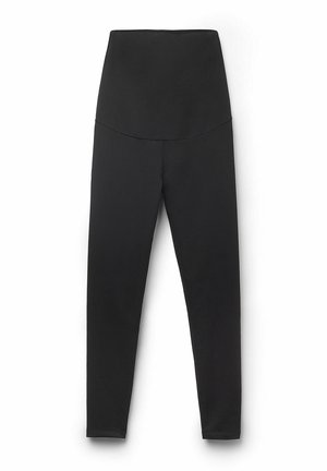 Zwarte high-waisted legging gemaakt van rekbare stof, met een gladde textuur en een aansluitend ontwerp zonder zichtbare hardware of patronen.