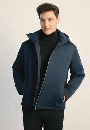 - Kurtka przejściowa