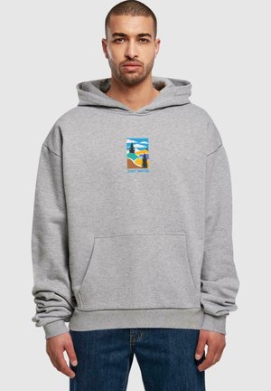 Grey hoodie made of cotton blend, featuring a front pocket and a graphic print of a landscape with trees, hills, and clouds.