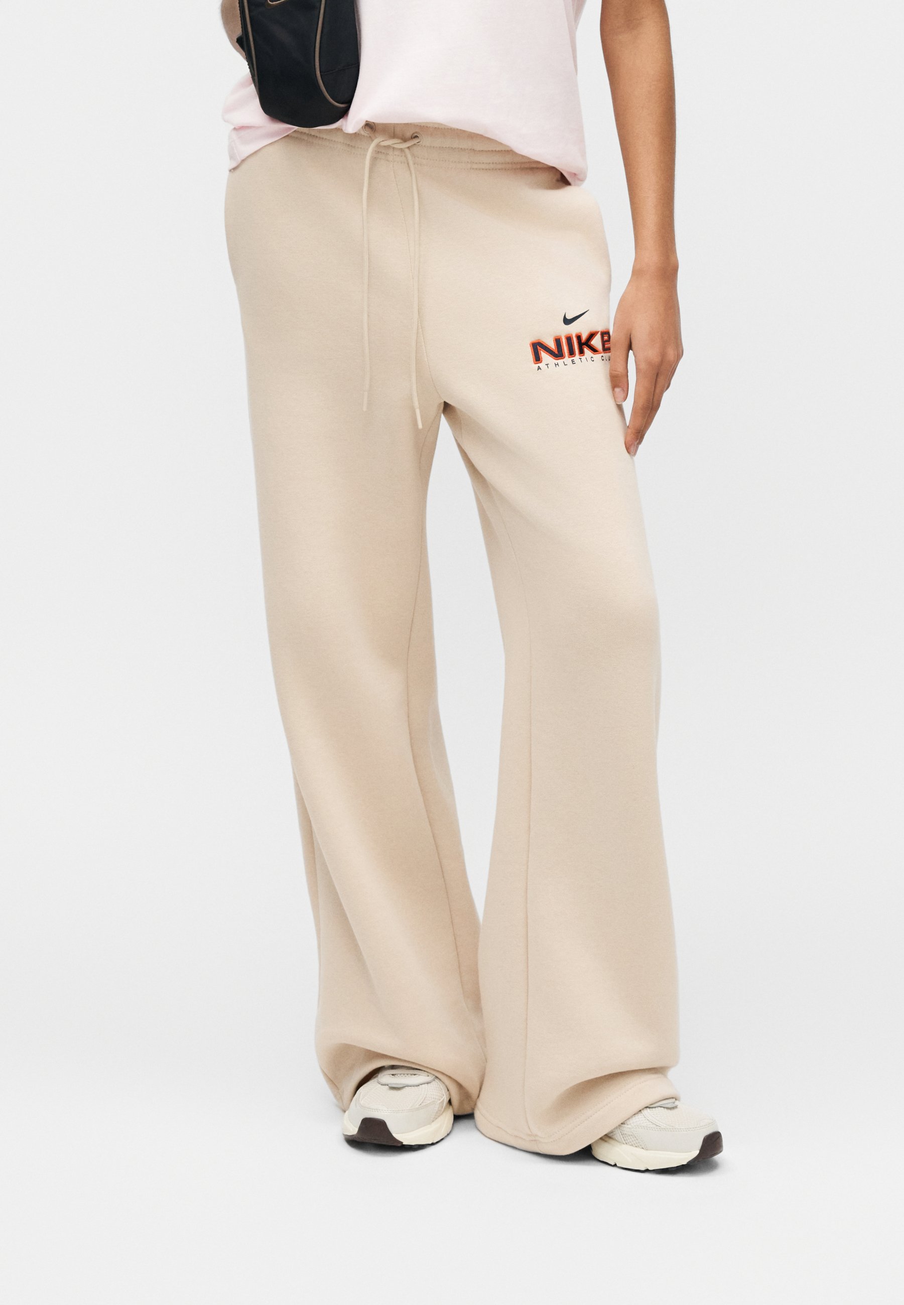 oatmeal nike swoosh joggers