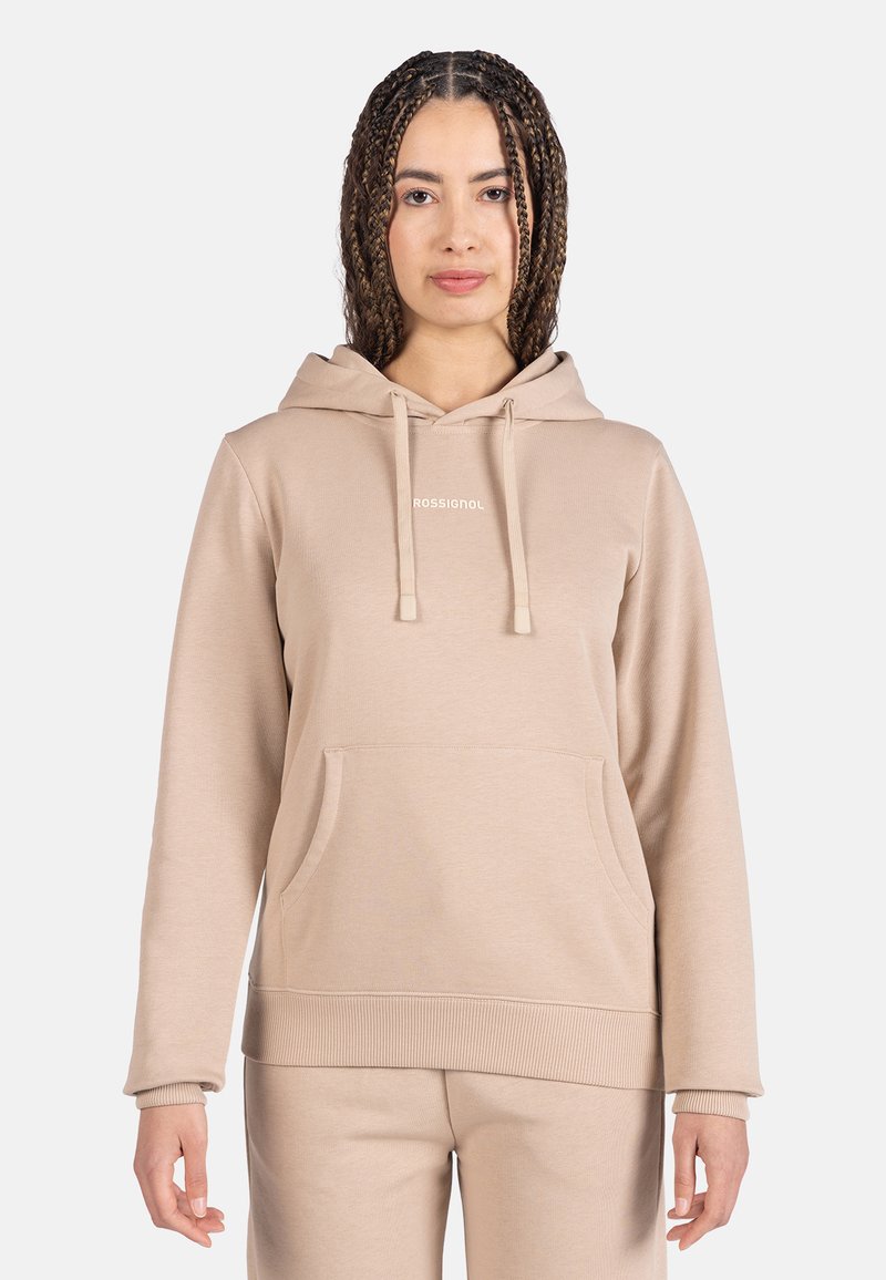 Sudadera beige con bolsillo canguro y puños acanalados. Presenta una capucha con cordón y el logo "ROSSIGNOL" en color claro en el pecho.