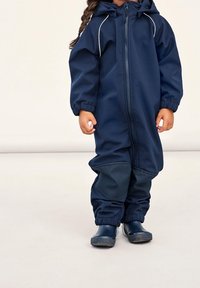 Name it NMNALFA SUIT SOLID UNISEX - Nepromokavý overal - dark sapphire