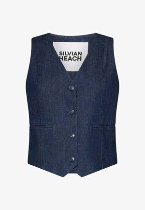 Gilet senza maniche in denim blu scuro con quattro bottoni e due tasche frontali orizzontali, con etichetta Silvian Heach all'interno del colletto.