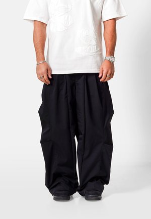 PLEATED - Broek - black
