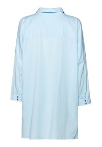 Light blue button-up shirt, features long sleeves, a collar, back yoke, and button details on cuffs, made of a soft, lightweight fabric.