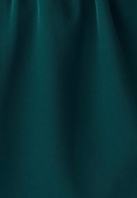 Teal kangas, jolla on sileä pinta, jossa on tasainen, matte-finish ja pehmeä valaistus. Ihanteellinen vaatteisiin tai verhoilukäyttöön.