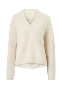 Cremefarvet sweater med V-hals, ribbet tekstur, lange ærmer og en afslappet pasform, der har en cropped kant og unikke detaljer.