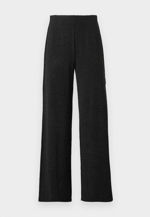 Pantaloni neri a gamba larga con vita alta e cuciture dritte, esposti su uno sfondo bianco.