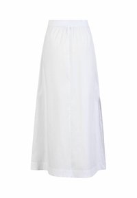 Jupe blanche longueur cheville avec taille élastique et petite fente latérale, réalisée en tissu léger.