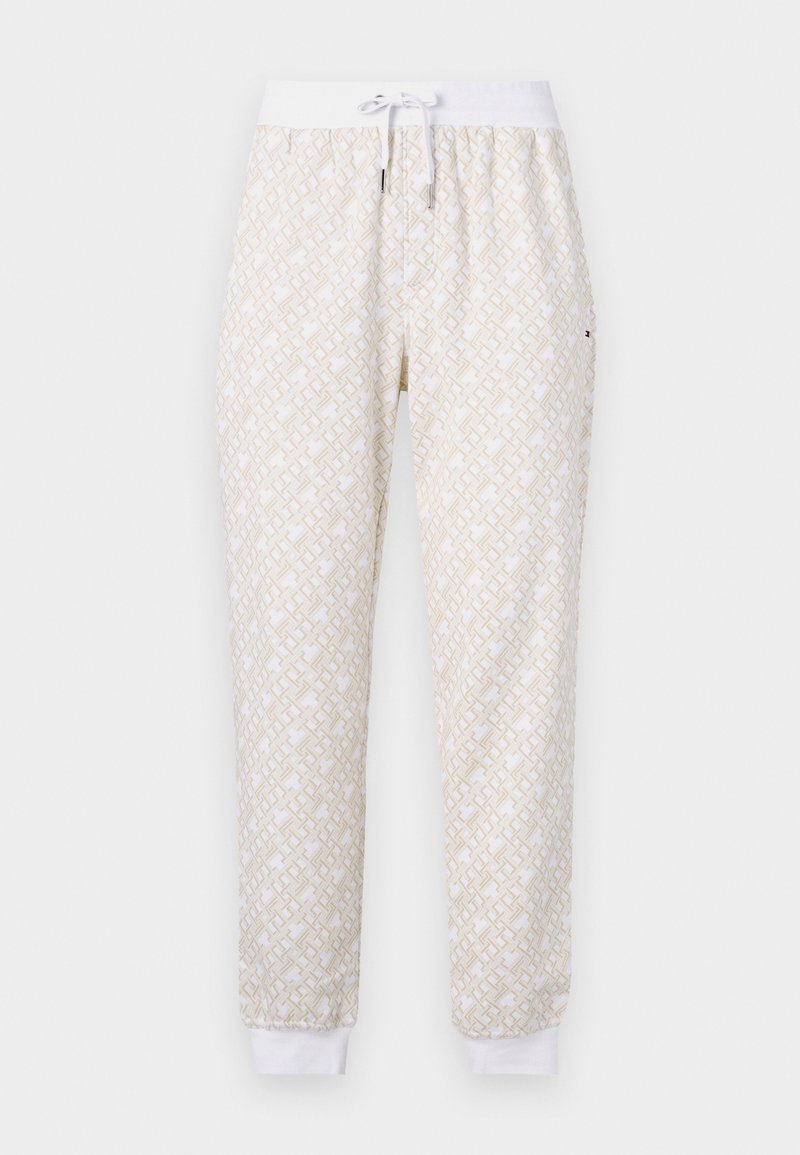 Geprinte joggingbroek met een lichtbeige en witte geometrische uitstraling, elastische tailleband met trekkoord en witte boorden aan de enkels.