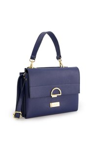 Navy leather handbag with a textured finish, gold hardware, a top handle, and an adjustable shoulder strap. Features a curved clasp detail.