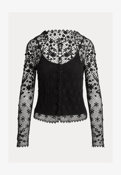 Black long-sleeve top made from lace featuring a floral pattern, scalloped edges, and button front with a fitted silhouette.