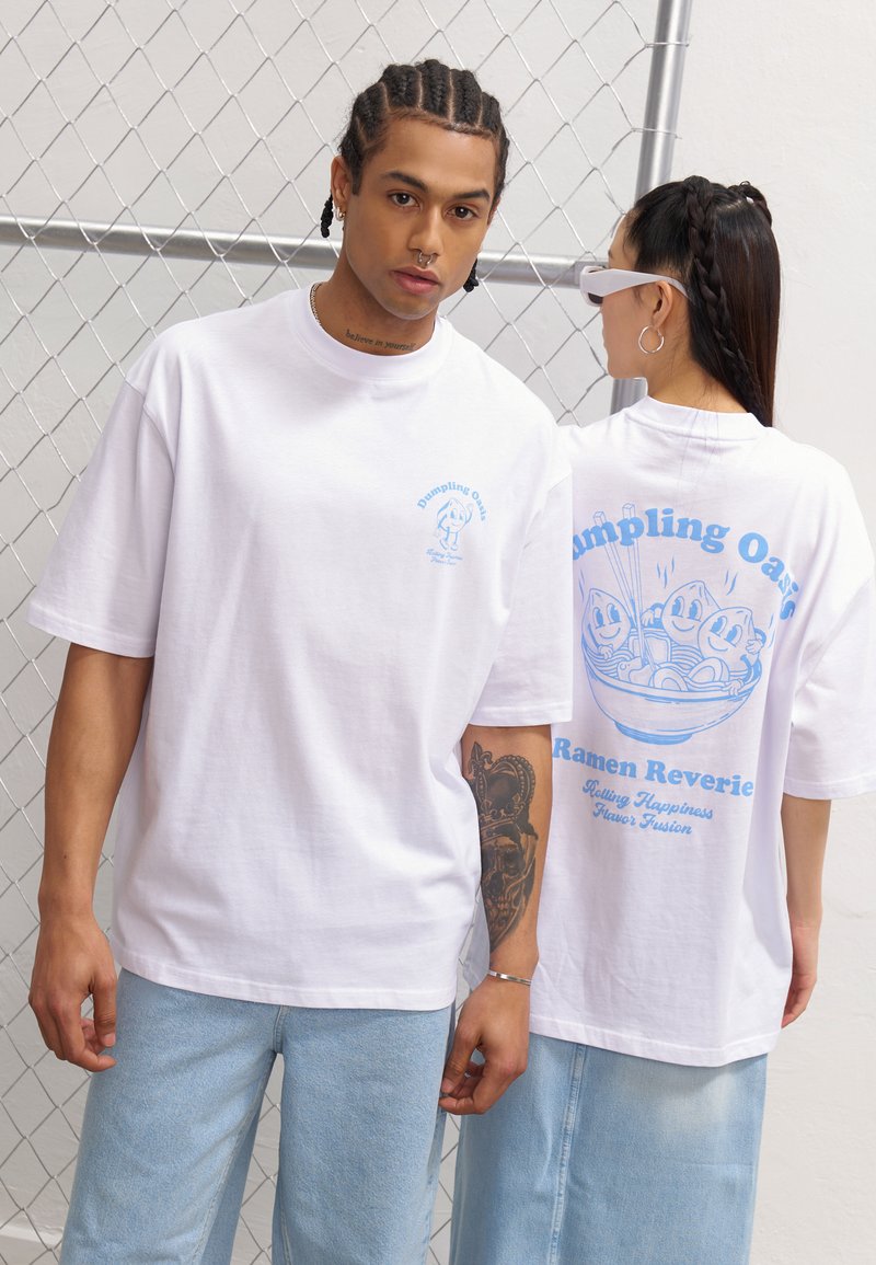 White cotton oversized t-shirt featuring light blue graphic designs on the front and back, depicting dumplings and ramen.