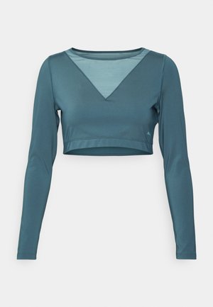 Puma PAMELA REIF TIGHT LONG SLEEVE - Hosszú ujjú felső - green