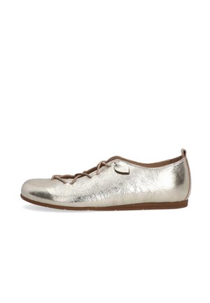 Metallic gold ballet flat shoe with a rounded toe and lace-up front, set against a plain white background.