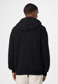 Fila APPAREL VALSERA REGULAR LOGO - Felpa con cappuccio - black