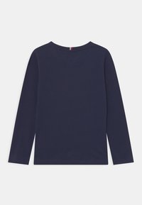 Námořnická modrá dámská mikina s dlouhým rukávem, kulatým výstřihem a V-ěkovým detailem na zadní straně. Vyrobena z měkké látky s hladkou strukturou.