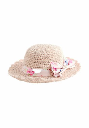 Light beige crochet sun hat with scalloped brim, decorated with a pink floral fabric band and bow.