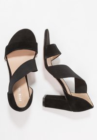 Pier One Sandaalit nilkkaremmillä - black