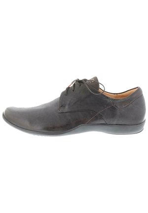 Braune Lederdressschuhe mit glatter Textur, runder Zehenform, subtilen Nähdetails und Schnürdesign. Mit einer flexiblen Gummisohle.