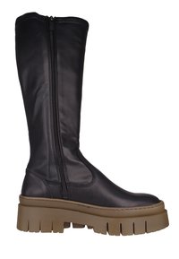 Black leather knee-high boot with a chunky brown sole, side zipper, and smooth texture. Features a sleek design and rounded toe.