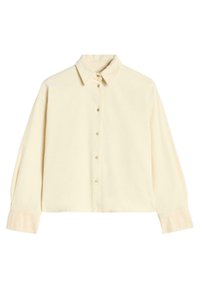 Maglietta button-up gialla chiara realizzata in un tessuto morbido, con colletto, maniche lunghe e un design cropped rilassato.