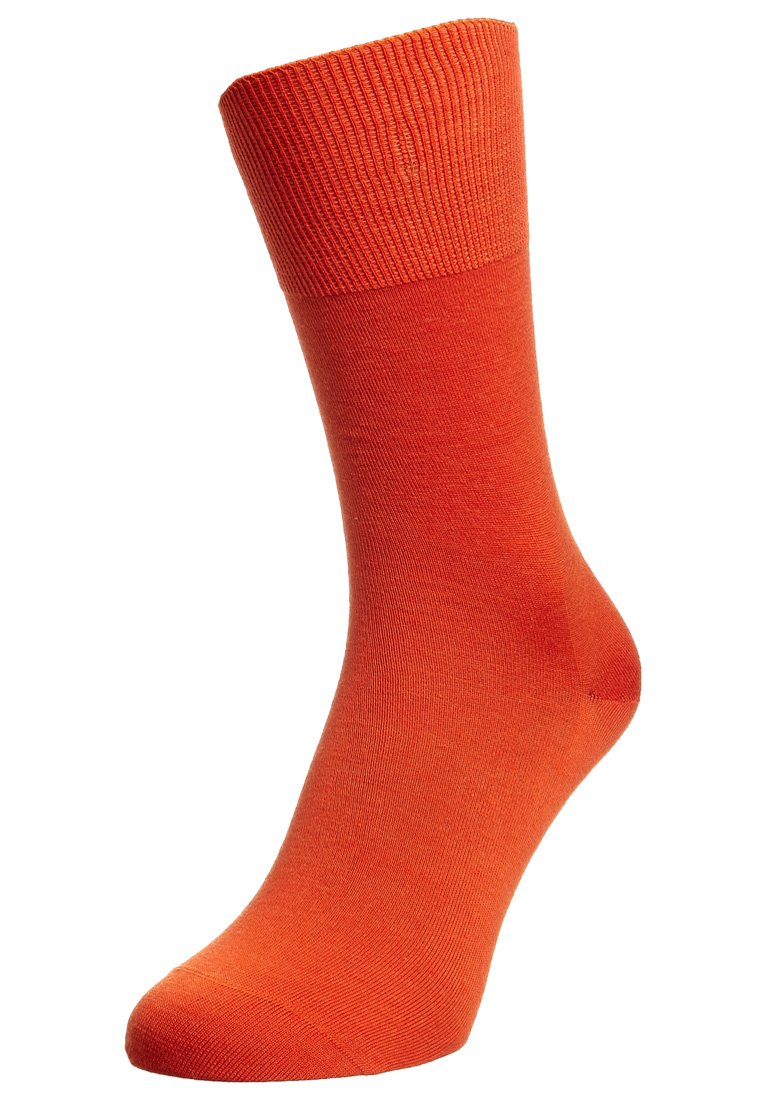 Oransje sokk med en ribbestrikket mansjett, glatt tekstur og en tilpasset form. Ingen synlige mønstre eller hardware-detaljer.