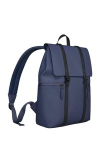 Navy blue backpack made of smooth material with a flap top, two front zippers, and black straps. Features a padded back for comfort.