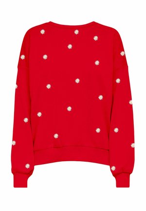 Sudadera roja de corte relajado, con bordados florales blancos dispersos en la espalda. Puños y bajo de punto que añaden textura.