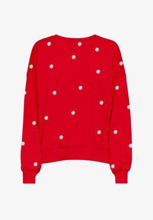 Czerwona bluza z luźnym krojem, ozdobiona białym kwiatowym haftem rozproszonym na plecach. Dzianinowe ściągacze na rękawach i u dołu dodają faktury.