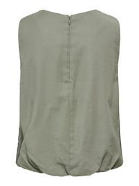Blouse sans manches vert olive clair avec fermeture éclair au dos et ourlet légèrement froncé pour une coupe ample.