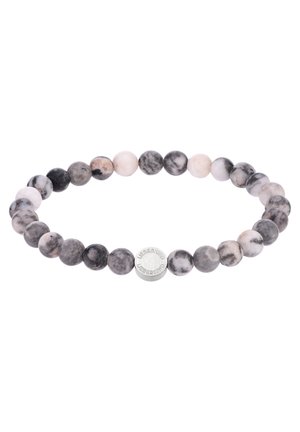 Bracelet extensible avec des perles rondes marbrées noires et blanches et une petite perle argentée gravée du mot "Liebeskind."