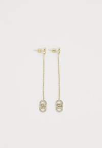 Boucles d'oreilles pendantes en ton or, présentant une chaîne avec des accents ovales ornés et de petites strass transparents pour le détail et l'éclat.