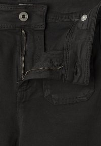 Svarta jeans i denim med silverfärgad dragkedja och knappstängning, med en dragkedjeförsedd ficka och ett strukturerat tyg.