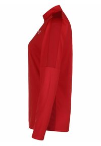 Camicia rossa a maniche lunghe con colletto alto, design aderente e inserti in rete ventilata sulle spalle. Realizzata in materiale traspirante.