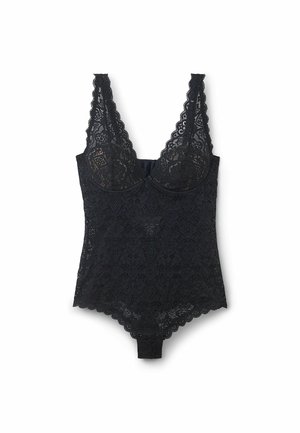 Zwarte kant bodysuit met een diepe v-hals, golvende schouderbandjes en intricatere bloemmotieven. Zachte, transparante textuur met drukknoopsluiting onderaan.