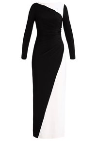Lång klänning med en svart och vit färgblockdesign, med en tvistad byst och långa ärmar, tillverkad av ett smidigt, elastiskt tyg.