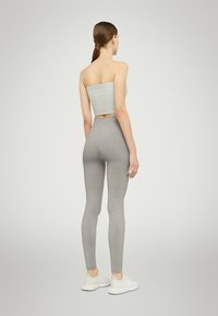 Wolford FADING SHINE - Leggings - titanium shine