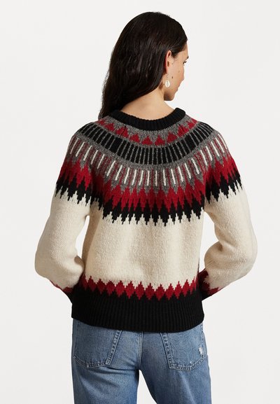 Kötött pulóver, amely tejszínbázissal rendelkezik, piros, fekete és szürke geometrikus mintával. Bordás fekete gallér és szegély. Hosszú ujjú.